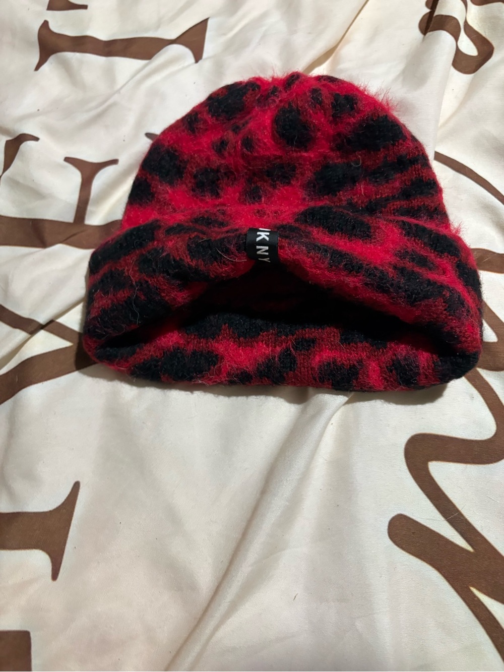 DKNY Red and Black Fuzzy Leopard Beanie
